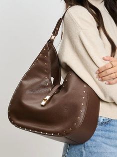 Vegan Leather Bag Turn-lock Loop Closure Stud Details Gold Hardware Exterior Zip Pocket Interior Zip Pocket 2 Interior Slip Pockets 📦 Free standard shipping on orders $150 or more 🛍️ Free in-store pick up at La Grange Luxury Shoulder Bag With Snap Closure For On-the-go, Brown Shoulder Bag With Turn-lock Closure And Double Handle, Brown Double Handle Shoulder Bag With Turn-lock Closure, Shopping Tote Bag With Turn-lock Closure, Brown Travel Bag With Turn-lock Closure, Brown Crossbody Bag With Silver-tone Hardware, Brown Leather Bag With Turn-lock Closure, Everyday Crossbody Bag With Turn-lock Closure, Brown Top Handle Shoulder Bag With Snap Closure