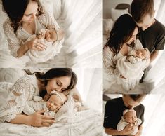 a woman holding a baby in her arms while laying on a bed with white sheets