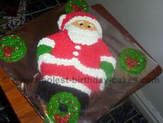 a santa clause cake sitting on top of a table