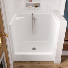 a white bath tub sitting inside of a bathroom