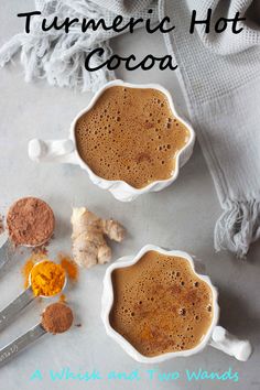 two white bowls filled with cocoa and spices