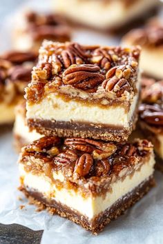 three pieces of pecan cheesecake stacked on top of each other