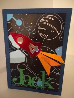 a card with an image of a rocket ship and the words jack on it