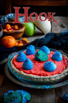 there is a pie with blue and red frosting on it