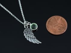 "This necklace is personalized so please let me know during checkout the two charms you want for this necklace, they can be two birthstones or two initials or one initial and one birthstone at check out. thank you! More Wings available: http://etsy.me/1nfDQXz . Back to the store .  https://www.davidflame.etsy.com  . Need more charms, 1inch extender chain, longer chain? Please follow this link: http://etsy.me/1lg9zUp . Description: . 925 Sterling Silver pendant.   21mm L  . 925 Sterling Silver Ch Personalized Pendant Charm Necklaces For May Birthstone, Personalized Pendant Charm Necklace For May Birthstone, Personalized Green Sterling Silver Charm Necklace, Personalized Green Sterling Silver Charm Necklaces, Sterling Silver Charm Necklace For Memorial, Sterling Silver Birthstone Necklace For Memorial, Customizable Sterling Silver May Birthstone Jewelry, Personalized Green Birthstone Necklace In Sterling Silver, Personalized Green Round Pendant Charm Necklace