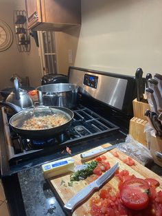 a stove top with some food on it