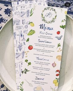 a menu on a plate with blue and white designs