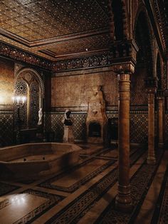 an ornately decorated room with columns and tiled walls