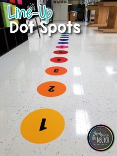 a line up of dots on the floor in a store