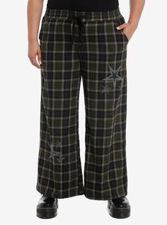 Lounge around while listening to your favorite music in these comfy pajama pants! They are green plaid and feature grunge-inspired star designs printed on the legs and back. Comes with side seam pockets and an elasticated waistband.60% cotton; 40% polyesterWash cold; dry lowImportedModel is 5'10''Model wears size 1 Pj Pants Aesthetic, Grunge Pajamas, Green Pajama Pants, Goth Pajamas, Green Pajamas, Girls Pajama Pants, Cutesy Outfit, Girls Pajama, Comfy Pajama