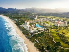 an aerial view of the resort and golf course