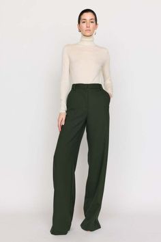 A timeless bootcut silhouette our cora pant is made from our italian twill suiting that’s blended with wool. this high-waist style features a front fly with zipper and a wide cuff at the hem. this classic forest hue invites neutrality and versatility to your wardrobe.    composition: wool twill  care: dry clean only  imported. Collar Jumper, Romantic Woman, Perfect White Tee, Trouser Pants Women, Wide Cuff, Lace Making, Frame Denim, Designer Outfits Woman, Jet Set