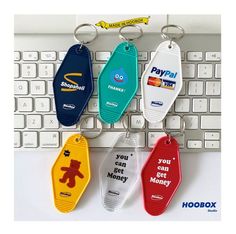 four keychains are attached to a keyboard with the words, you can get money