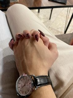 a person with their hands on the wrist of another person