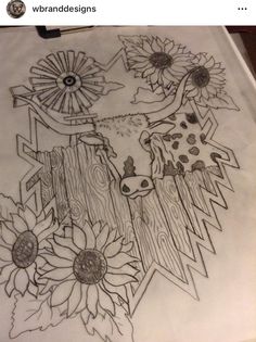 a drawing with sunflowers and a cow on it