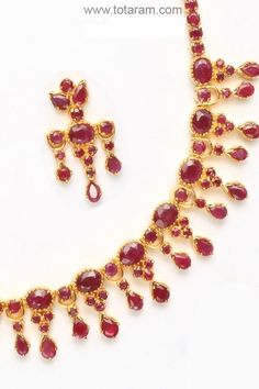 Rubies Necklace & Long Earrings Set in 22 Karat Gold.
  Gross Gold Weight of Necklace Set: 38.500 grams
  Total Weight of Rubies: 25.0 Carats
  
    Note: We can make this same design with Emeralds, Blue Sapphire 
  or in any other colored stone of your choice for the same price. - 235-SET276 - in 38.500 Grams for USD $3617.49. 
Made in India by Totaram Jewelers Online this product is in Gold - 22 Karat BIS Hallmark 916 KDM Gold  & is an excellent gift for Adult - Women. Ships fully i Blue Sapphire Gold Necklace Indian, Rubies Necklace, Gold Ruby Necklace, Ruby Bangles, Trendy Blouse, Gold Designs, Ruby Emerald, Jewellery Sets, Colored Stone