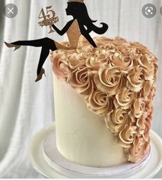 there is a cake that has a woman on it