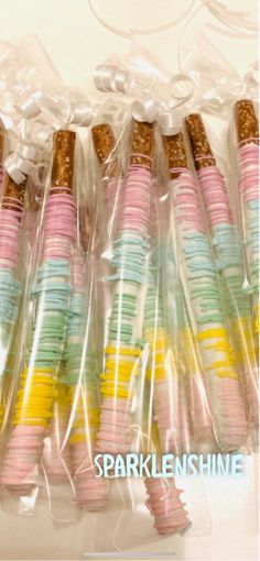 there are many small candy sticks wrapped in plastic