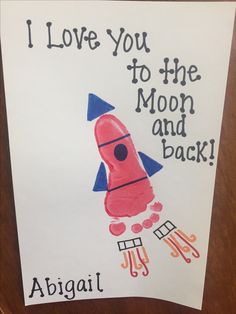 a child's handmade card with the words i love you to the moon and back