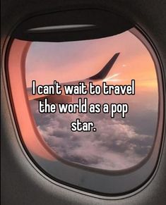 an airplane window that says i can't wait to travel the world as a pop star