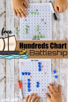 two hands are playing with the hundreds chart battleship game