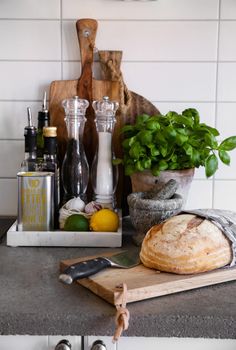 a loaf of bread sitting on top of a cutting board