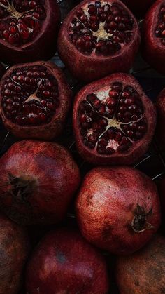 the pomegranates have been cut in half and are ready to be eaten