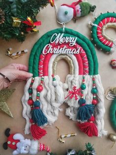 christmas decorations are laid out on the table