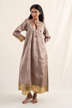 Dusty brown silk chanderi tissue angrakha kurta with gold lampi and metal work embroidery. Paired with coordinating wide leg pants. - Aza Fashions Festive Long Sleeve Chanderi Kaftan, Silk Anarkali Kurta With Long Sleeves, Eid Long Sleeve Tussar Silk Anarkali Set, Silk Anarkali Long Sleeve Kurta, Anarkali Silk Kaftan With Long Sleeves, Silk Long Sleeve Anarkali Set For Diwali, Silk Anarkali Kaftan With Long Sleeves, Silk Anarkali Long Sleeve Kaftan, Silk Long Sleeve Anarkali Set For Festivals