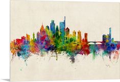 a colorful city skyline is shown with watercolor paint