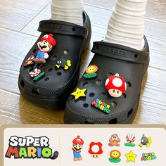 there is a pair of black shoes with mario and other characters on them, along with the words super mario