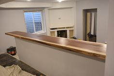 an unfinished kitchen counter in the process of being installed