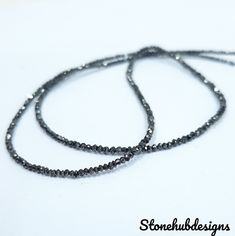 This Listing Is For Natural Black Diamonds faceted Rondelle beads- Black Diamond Beads Full Length Strand- 1.50 mm - Gemstone: Black Diamond Beads Shape: Rondelle Beads Size : 1.50 mm approx. length: 16 Inch Color: Black Quantity: 1 strand Quality: AAA MORE BEAUTIFUL THAN PICTURES ! Black Rondelle Beaded Necklaces, Black Beaded Rondelle Necklace, Black Rondelle Spacer Beads Jewelry, Black Faceted Beads For Gifts, Black Beaded Rondelle Jewelry, Black Rondelle Gemstone Beaded Necklace, Black Faceted Round Beaded Necklaces, Black Jewelry With Oval Faceted Beads, Black Jewelry With Faceted Oval Beads