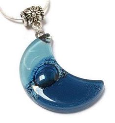 Baby blue and Blue moon shape glass pendant The Glass bead is approx 1.25'' long and .75'' wide. The chain is approx 18 inches long. Silver Plated "snake" chain with a lobster claw clasp. (if you need a longer chain please send a note with your purchase) All the jewelry is handmade out of recycled glass. This is real glass that comes from windows and other more traditional sources. The glass is cut and assembled, then fired in a kiln to fuse round sharp edges and improve the colors and texture o Fused Glass Necklace, Fused Glass Pendant, Stained Glass Crafts, Fused Glass Jewelry, Moon Shape, Eco Friendly Jewelry, Beads Earrings, Homemade Jewelry, Jewelry Beads