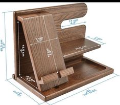 a wooden stand with measurements for the top and bottom section, including an open shelf