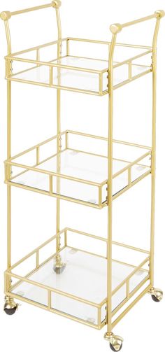 a gold serving cart with three glass shelves on each side and two metal wheels at the bottom