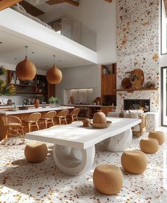 a large white table sitting in the middle of a living room