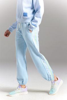 Once you’re in these, you’ll never, ever want to take them off. The Tearaway Zip Pants is made from soft cotton for an elevated look for to & from or post-practice recovery. Seriously snuggly & breathable, with front patch pockets & a drawstring waistband — pairs perfectly with any look. Spring Cotton Loungewear Activewear, Sporty Full-length Bottoms For Lounging, Blue Athleisure Joggers For Loungewear, Blue Joggers For Loungewear Athleisure Style, Spring Cotton Sweats For Workout, Blue Sporty Lounging Activewear, Relaxed Blue Pants For Lounging, Blue Sporty Activewear For Lounging, Sporty Blue Activewear For Lounging