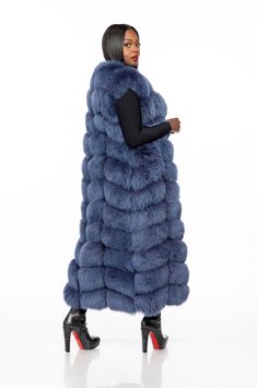 The Gina Full Length Fox Fur vest is an iconic pice that will keep you stylish and warm. This vest features 100% genuine fox fur panel, is lined with satin, and closes with hooks. The length of this vest is 130cm/ 51 inches. This vest runs true to size. If you want a more relaxed fit, please order one size up. Model is typically a size Large and is wearing a size XL in the color Fancy Blue. The Gina vest can be customized in any color and any size. Due to the customizable nature, this piece can Fur Vest Outfit Ideas, Cowboys Outfits, Fur Vest Outfit, Fur Coat Outfits, Fur Vest Outfits, Winter Maxi, Fox Fur Vest, Fur Gilet, Winter Fur Coats