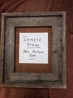 an old wooden frame with a note attached to the bottom that says sample frames not actual size