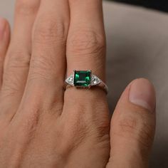 This is a gorgeous handmade creation. Its beauty is its simplicity & Elegance. The 7*7 mm square shape faceted lab emerald is crafted in solid sterling silver and with rhodium plated. All item is sent in a beautiful gift box If you have any idea of design your ring,pls contact me directly. You can realize more lovely stuff clicking the link https://www.etsy.com/shop/knightjewelry?refshopsection_shophome_leftnav Please leave the correct address and you phone number for delivering successfully Classic Princess Cut Emerald Jewelry, Anniversary Emerald Ring With Bezel Setting, Fine Jewelry Emerald Ring With Square Cut For Promise, Rectangular Sterling Silver Emerald Ring For Wedding, Fine Jewelry Emerald Square Cut Promise Ring, Rectangular Emerald Ring In Sterling Silver For Wedding, Silver Emerald Ring Princess Cut, Elegant Sterling Silver Princess Cut Emerald Ring, Square Cut Emerald Jewelry With Accent Stones