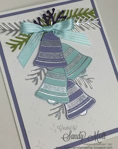 a handmade christmas card with blue and green decorations