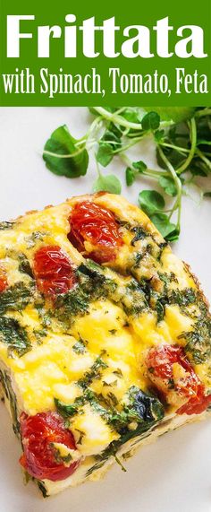 frittata with spinach, tomato, and feta cheese on a white plate