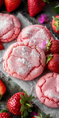 strawberry shortbread cookies with powdered sugar and fresh strawberries on the side, ready to be eaten