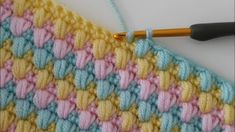 the crochet stitch is being worked on