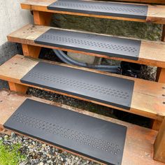 the steps are made out of wood and have perforated metal treads on them