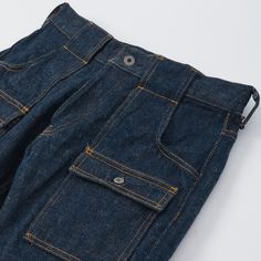 Showcasing a very playful venture into the world of ‘workwear’, ONI have brought us a 20oz slim ‘Bush Pant’. Cut from the brand’s lust worthy ‘Secret Denim’ this slim/straight offering boasts features from American workwear, including two button flap utility pockets on the thigh, and a further two on the rear. The denim is a perfectly slubby masterpiece, which has been woven on vintage shuttle looms at super low tension for an uneven effect, and the weft yarns have been dyed beige, and poke thro Japanese Workwear Vintage, Jean Back Pocket, Bush Pants, Japanese Workwear, American Workwear, Workwear Vintage, Denim Workwear, Workwear Pants, Workwear Jeans