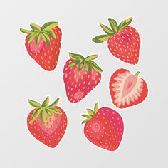 four strawberries stickers on a white background