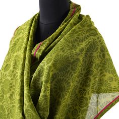 MATYO GREEN PRINTED MULMUL SCARF / STOLEMaterialsSoft mulmul / fine cotton voileDimensions65X200 cms OR 25X80 inchesA very summary vibrant Green Matyo print scarf accented with hot pink piping on one side This scarf is super soft and stylish,a perfect gift for any occasion for your loved ones. The Print pattern is inspired by timeless classic motif & patterns of vibrant and colourful Hungarian Embroidery style MATYO which has thick, lush stitches – packed with color and flowers, especially r Green Dupatta Scarf Shawl, Traditional Green Cotton Scarves, Green Bohemian Dupatta With Floral Print, Bohemian Green Dupatta With Floral Print, Green Bohemian Style Dupatta, Green Printed Cotton Dupatta, Green Cotton Dupatta With Floral Print, Green Floral Print Cotton Dupatta, Green Cotton Fabric With Printed Motifs