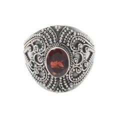 A deep red gemstone peeks out from the center of this lovely cocktail ring designed by Bali's Arta Pradana. The artisan centers the ring with a faceted garnet while traditional Balinese designs swirl around the stone adorning the ring's thick sterling silver band. Formal Garnet Rings With Gemstone Accents, Garnet Rings With Intricate Design, Ornate Garnet Round Rings, Ornate Round Garnet Rings, Garnet Ruby Ring With Intricate Design As Gift, Garnet Rings With Intricate Design For Gift, Oval Garnet Jewelry With Intricate Design, Oval Garnet Rings With Gemstone Accents, Ornate Garnet Ruby Ring As Gift